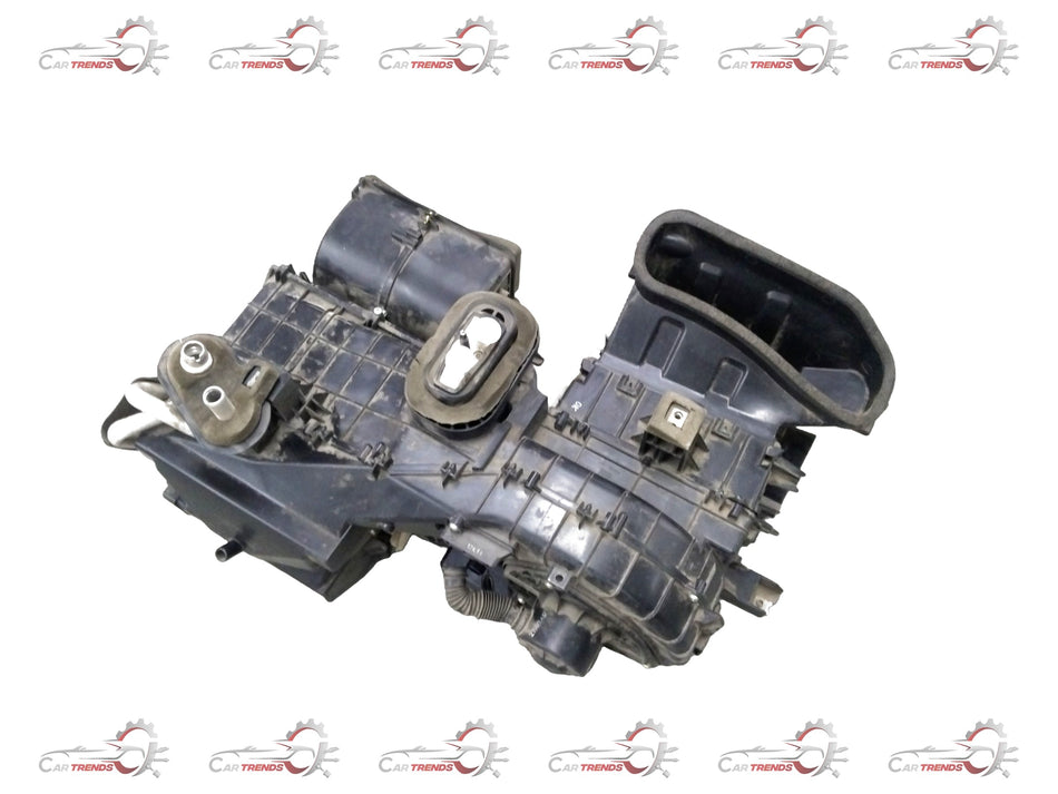 General Motors Chevrolet Beat air conditioning evaporator module assembly, showing the heater and cooling components.