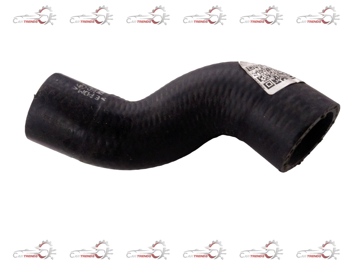 Radiator inlet hose for Chevrolet Astra engine, manufactured by General Motors, shown in close-up on a vehicle engine.