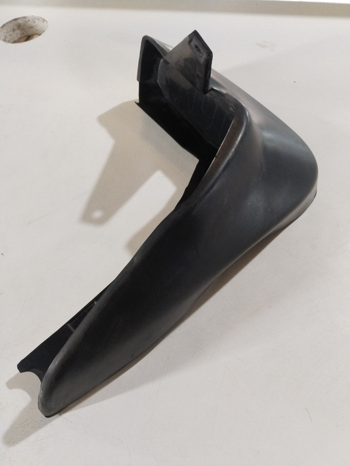 CarTrends city left rear mud guard installed on vehicle, showcasing durable black plastic mud flap for rear wheel protection