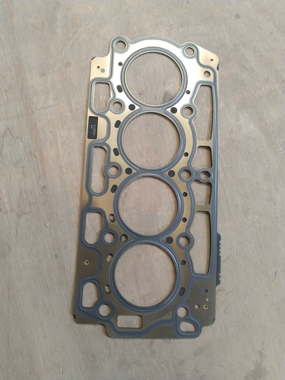 Ford cylinder head gasket AV2Z6051D showing the gasket's shape and metal edges for Ford engine repair and replacement.
