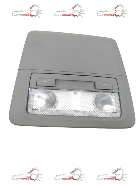 Chevrolet Cruze bezel dome lamp by General Motors, showing the clear plastic cover and mounting hardware for interior lighting replacement.