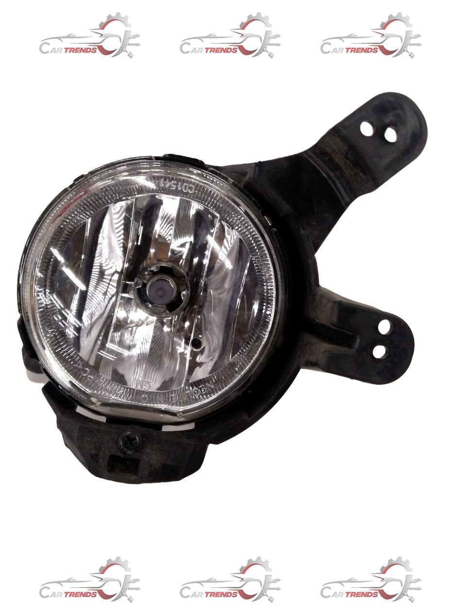 Front fog lamp assembly for Chevrolet Beat by General Motors, showing the clear lens and mounting bracket.