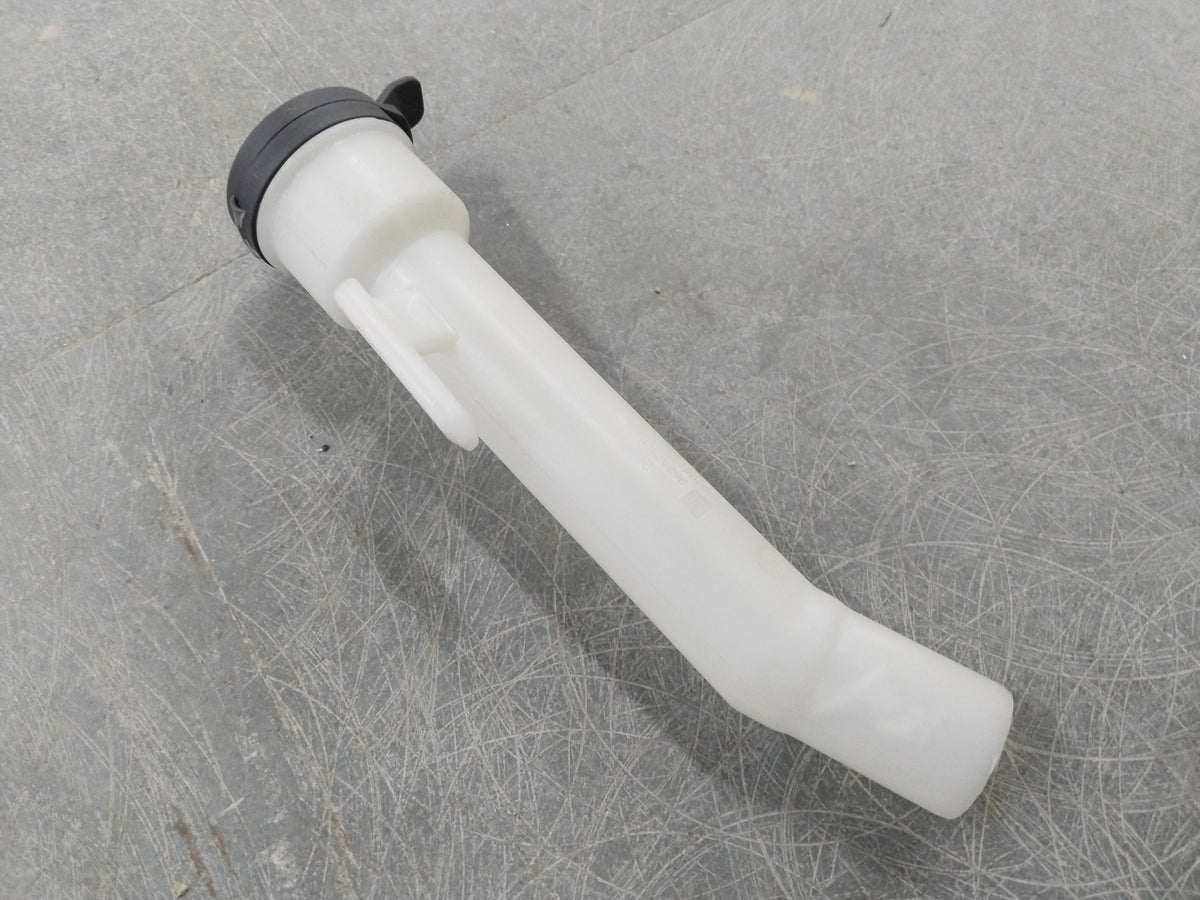 General Motors Chevrolet Cruze windshield washer solvent container filler with labeled cap and clear plastic body.
