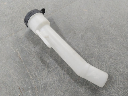 General Motors Chevrolet Cruze windshield washer solvent container filler with labeled cap and clear plastic body.
