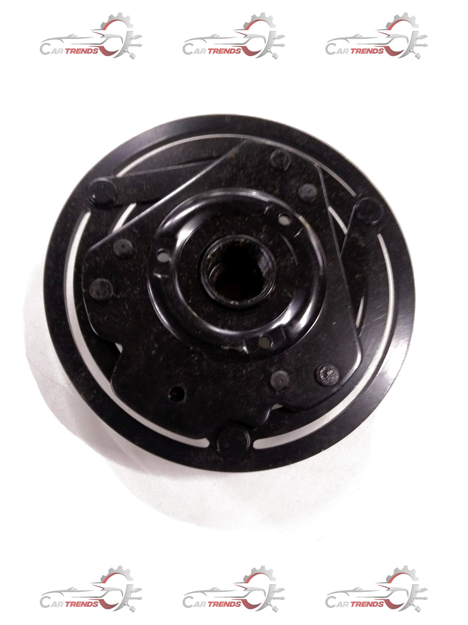 General Motors Chevrolet Aveo clutch drive assembly, showing the mechanical clutch components and metal parts.