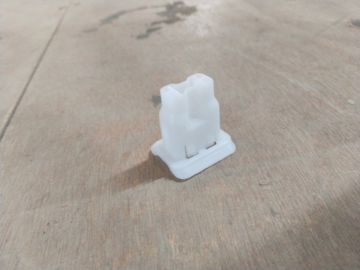 Suzuki A-Star rear cushion seat hook spare part by CarTrends, shown in close-up view of the black hook component.
