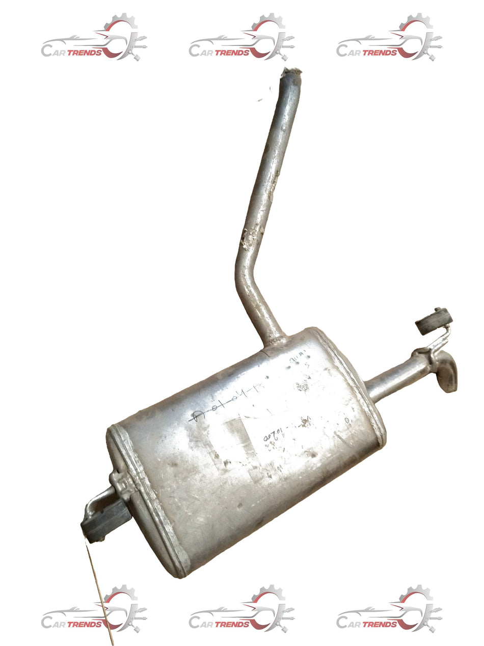 CarTrends muffler for Creta, spare part image showing the metallic muffler with inlet and outlet pipes.