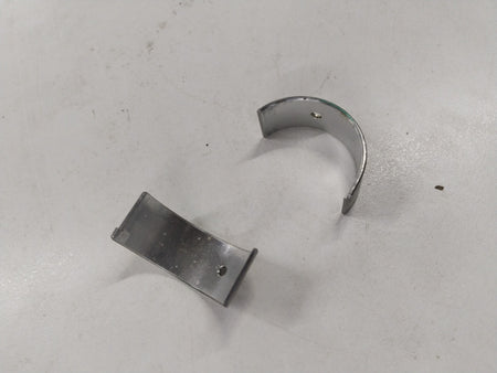 Chevrolet Aveo bearing connecting rod by General Motors, showing metal component with smooth finish and precision-machined surfaces.