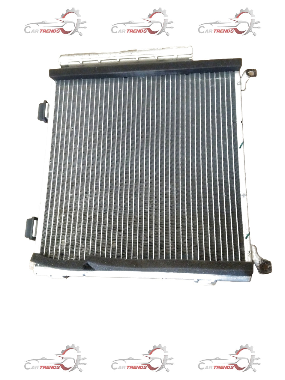 MARUTI SUZUKI AC condenser for WagonR 2nd Gen, A-Star, Zen Estilo; compatible with petrol and CNG engines.