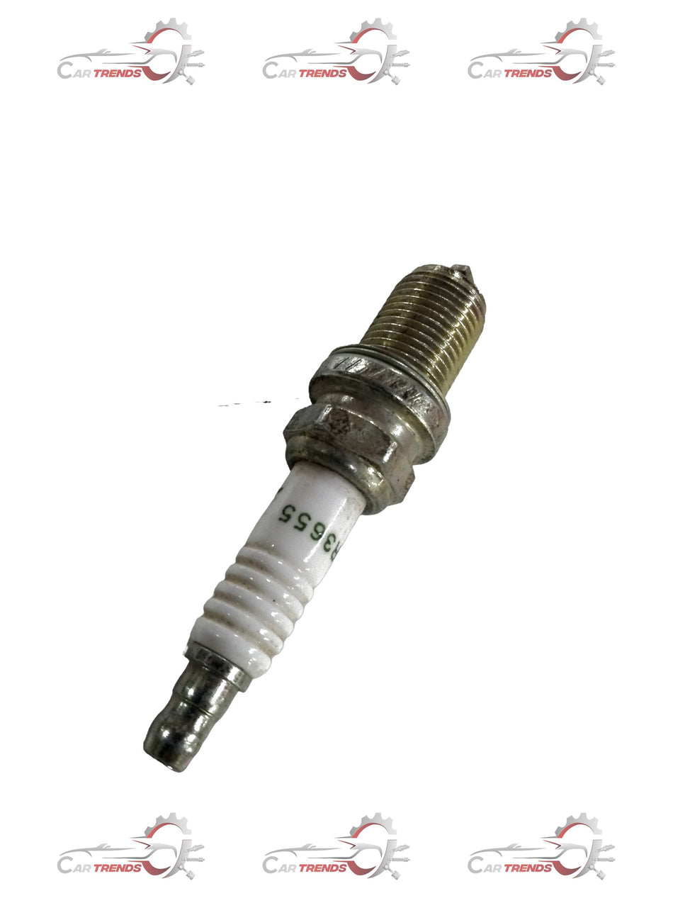 AC Delco spark plug for Chevrolet cars, showing the metal threaded end and ceramic insulator, suitable for all variants.