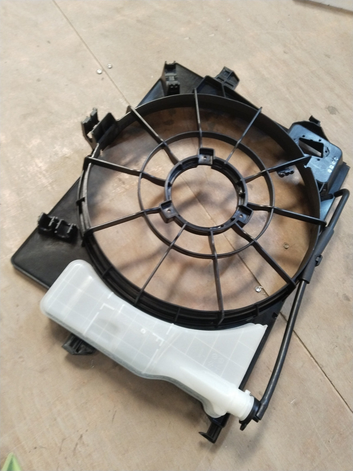 Hyundai I20 Active fan shroud in black, front view showing the fan cover and mounting points.