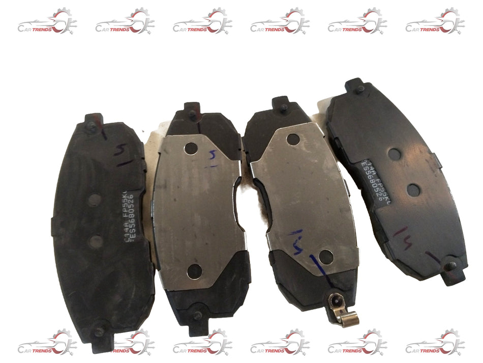 Front brake pad for Maruti Suzuki SX4, showing the new replacement brake pad with detailed metal and friction surface.