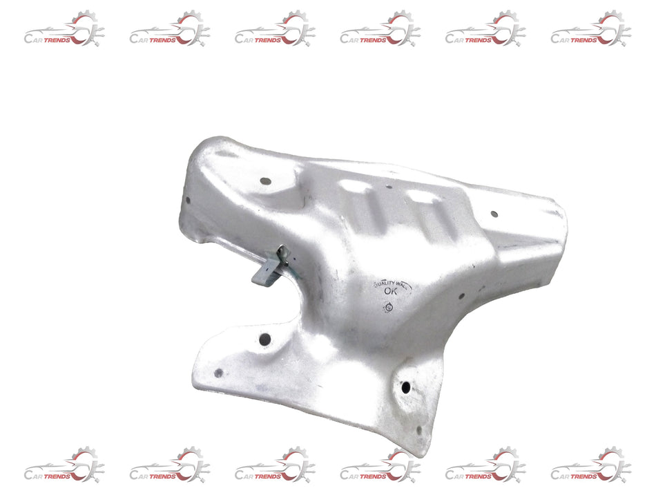 CarTrends Nissan Micra exhaust manifold cover, close-up view showing metal finish and mounting points.