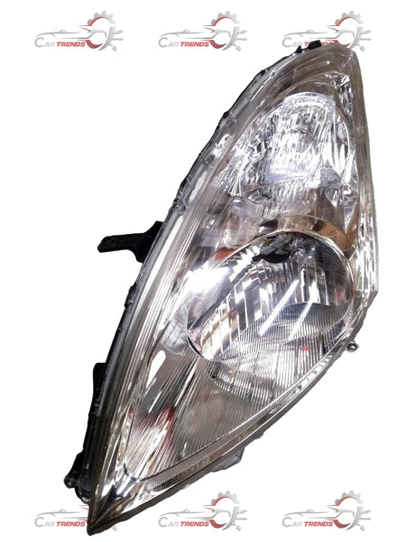 CarTrends Swift 2nd Gen left headlamp assembly showing clear lens and mounting brackets for vehicle lighting upgrade.