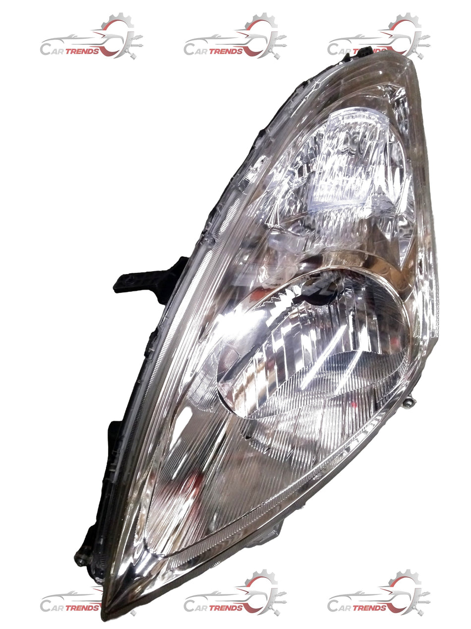 CarTrends front right head lamp with motor for Maruti Ertiga 2012-2018, showing the detailed headlight assembly.