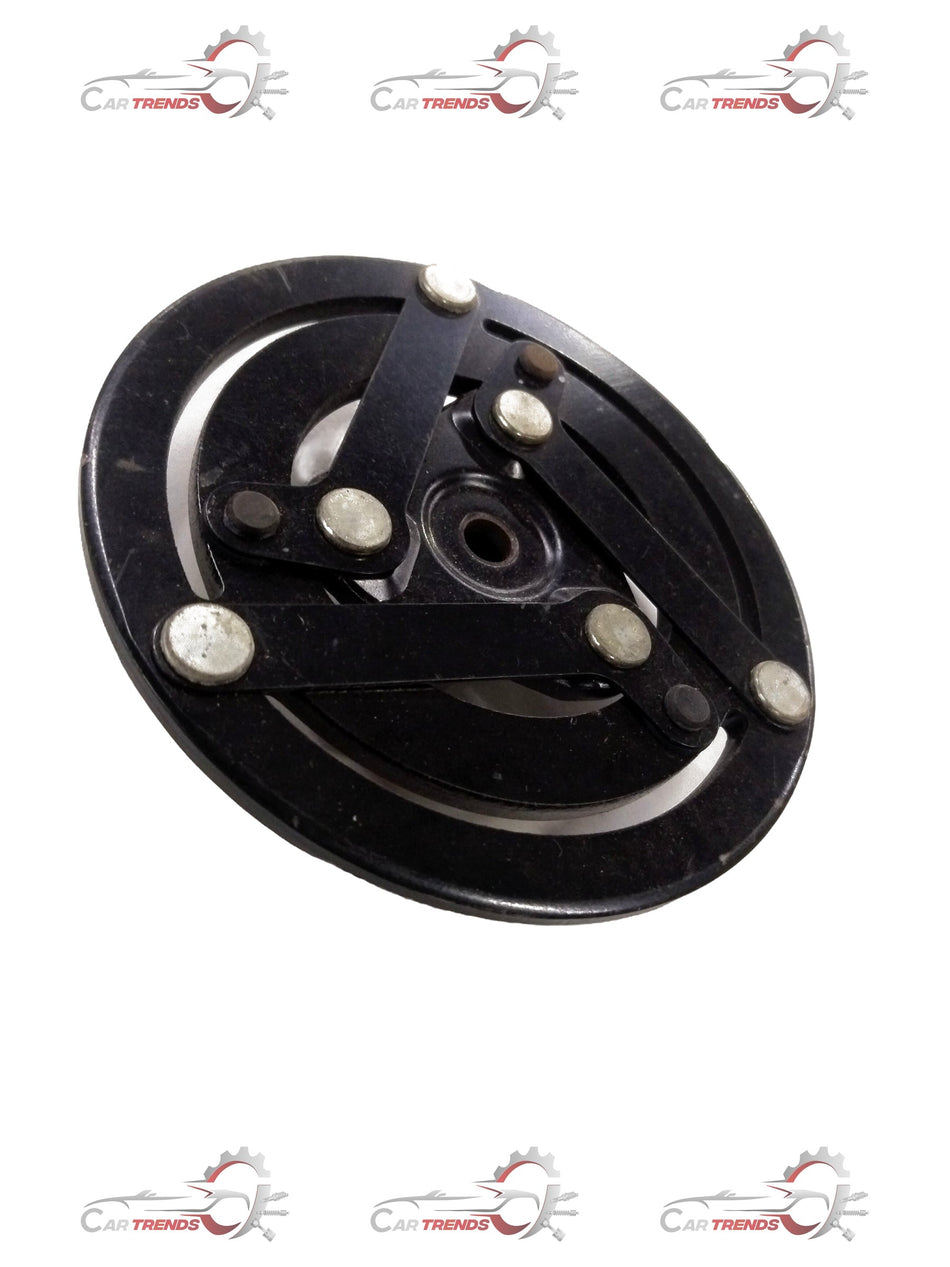 Chevrolet Aveo clutch drive assembly by General Motors, showing the metal clutch components and mechanical parts.