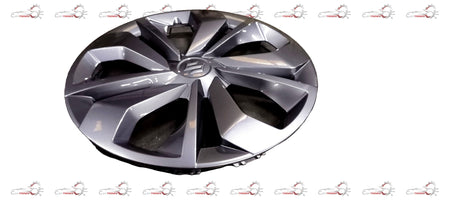Maruti Suzuki full wheel hub cap assembly showing metal wheel cover with brand logo and mounting clips.