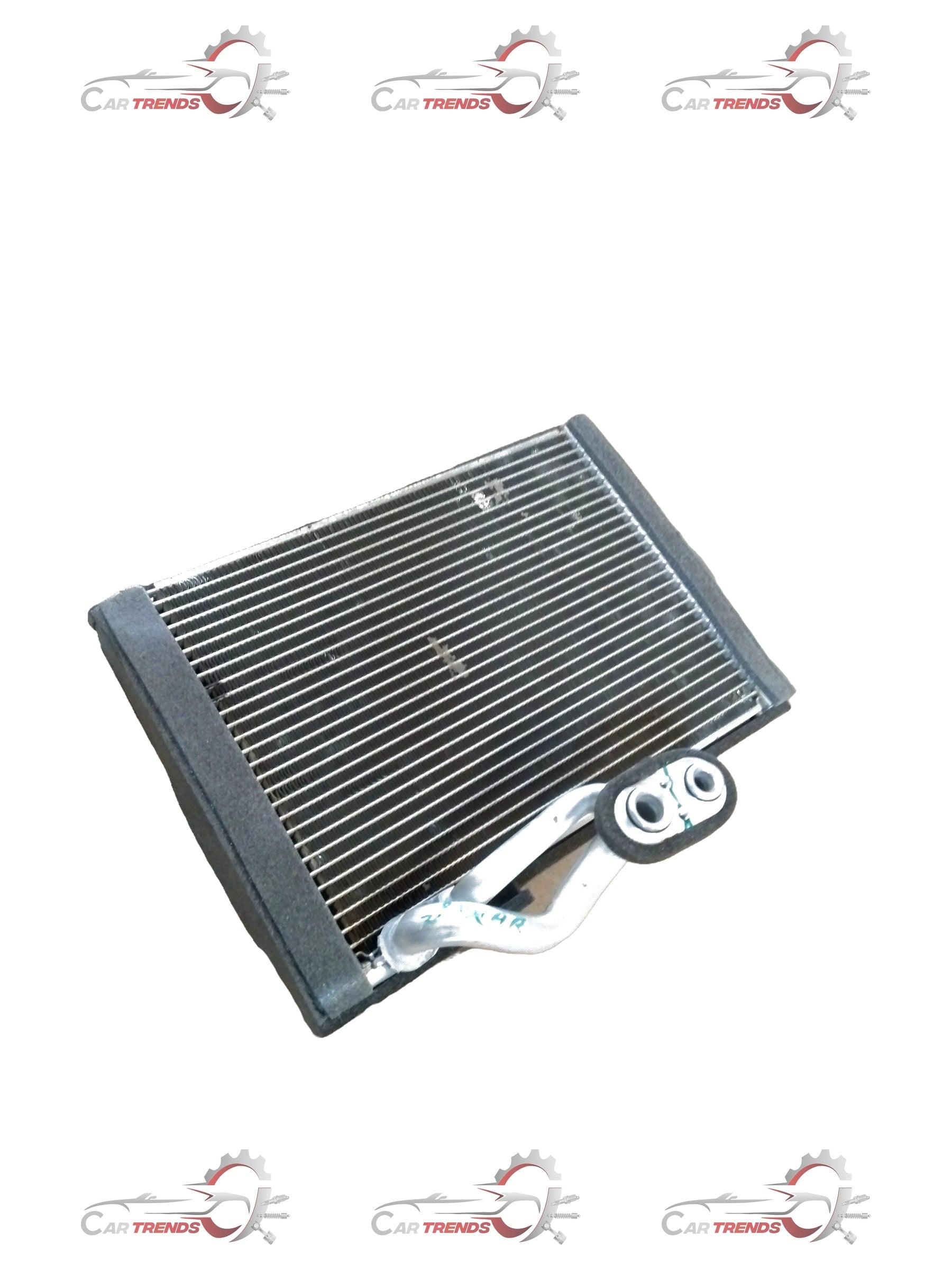 Maruti Suzuki evaporator sub-assembly part 95411M56R00 showing the compact HVAC component for vehicle air conditioning systems.