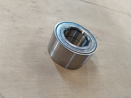 Front wheel bearing for cars, CarTrends Xcent spare part #517200U000, shown in black with metal components.