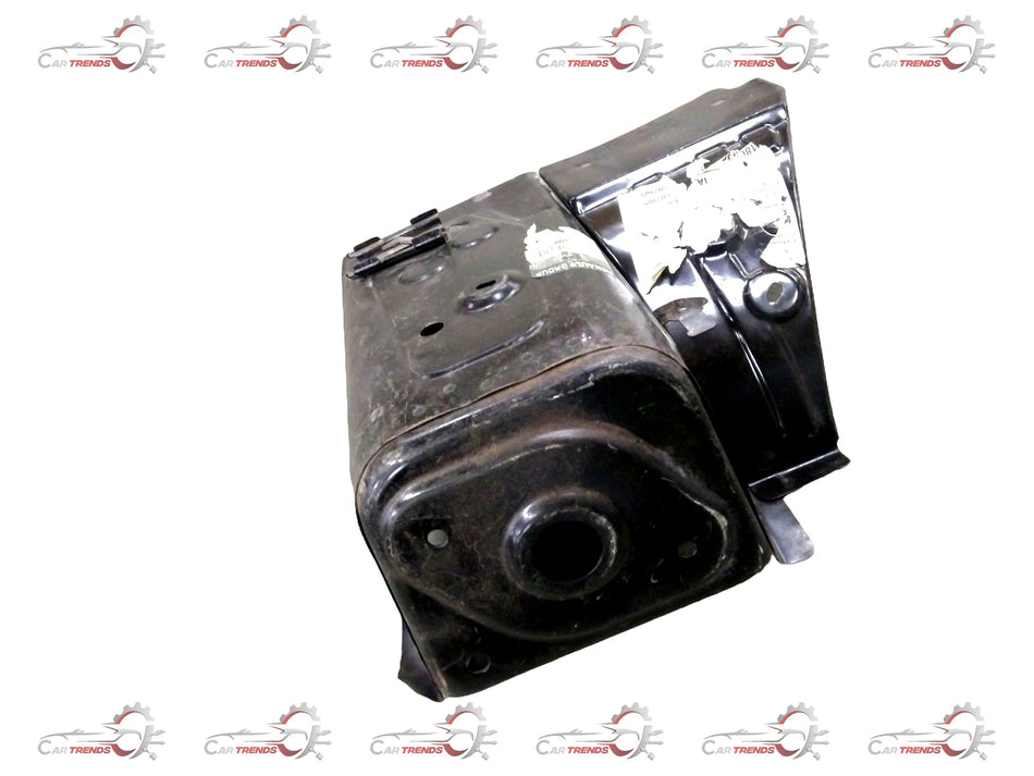 Renault Kwid strut housing assembly by CarTrends, showing the metal component with mounting points and mechanical details.