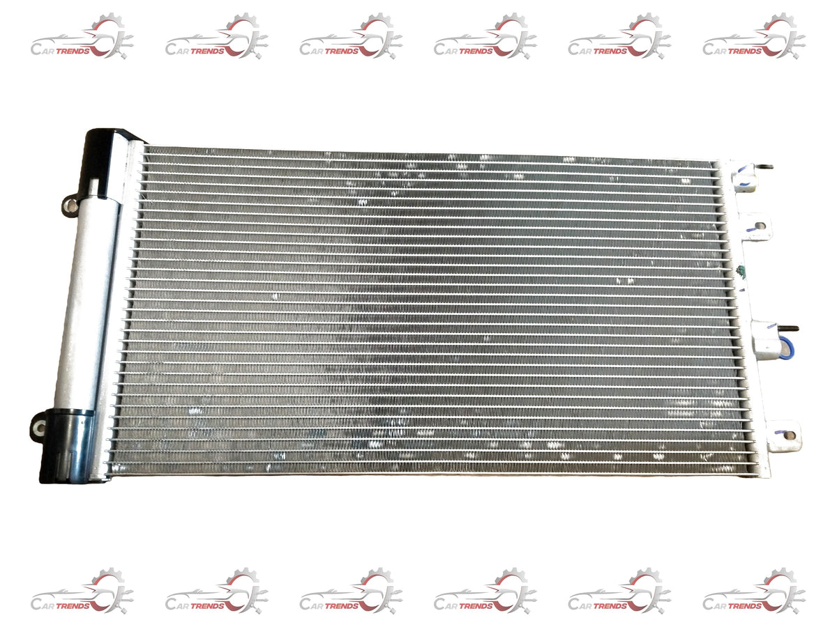 CarTrends Tata Nexon air conditioning condenser with copper tubes and aluminum fins, installed in the engine bay.
