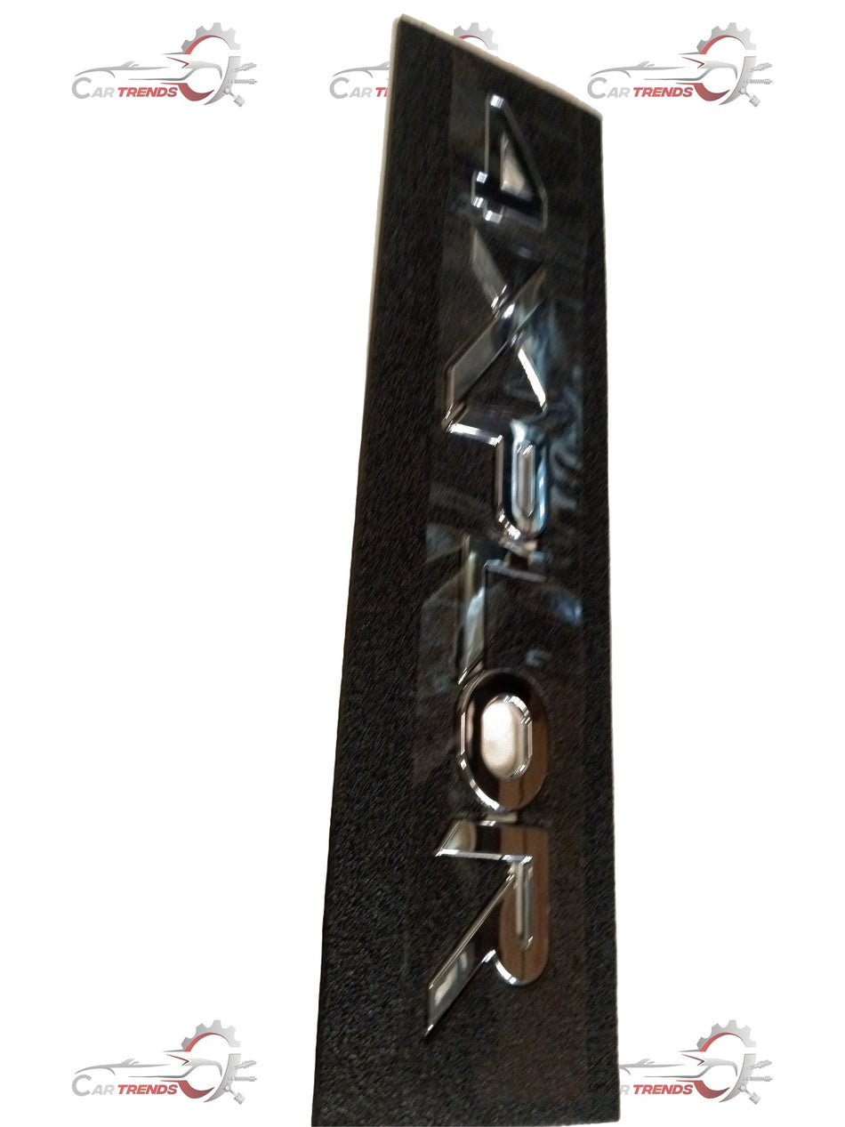 CarTrends Badge Variant 4XPLOR Scorpio-N, #2302GZ100321N, metal emblem with black and silver finish, designed for Scorpio-N vehicles.