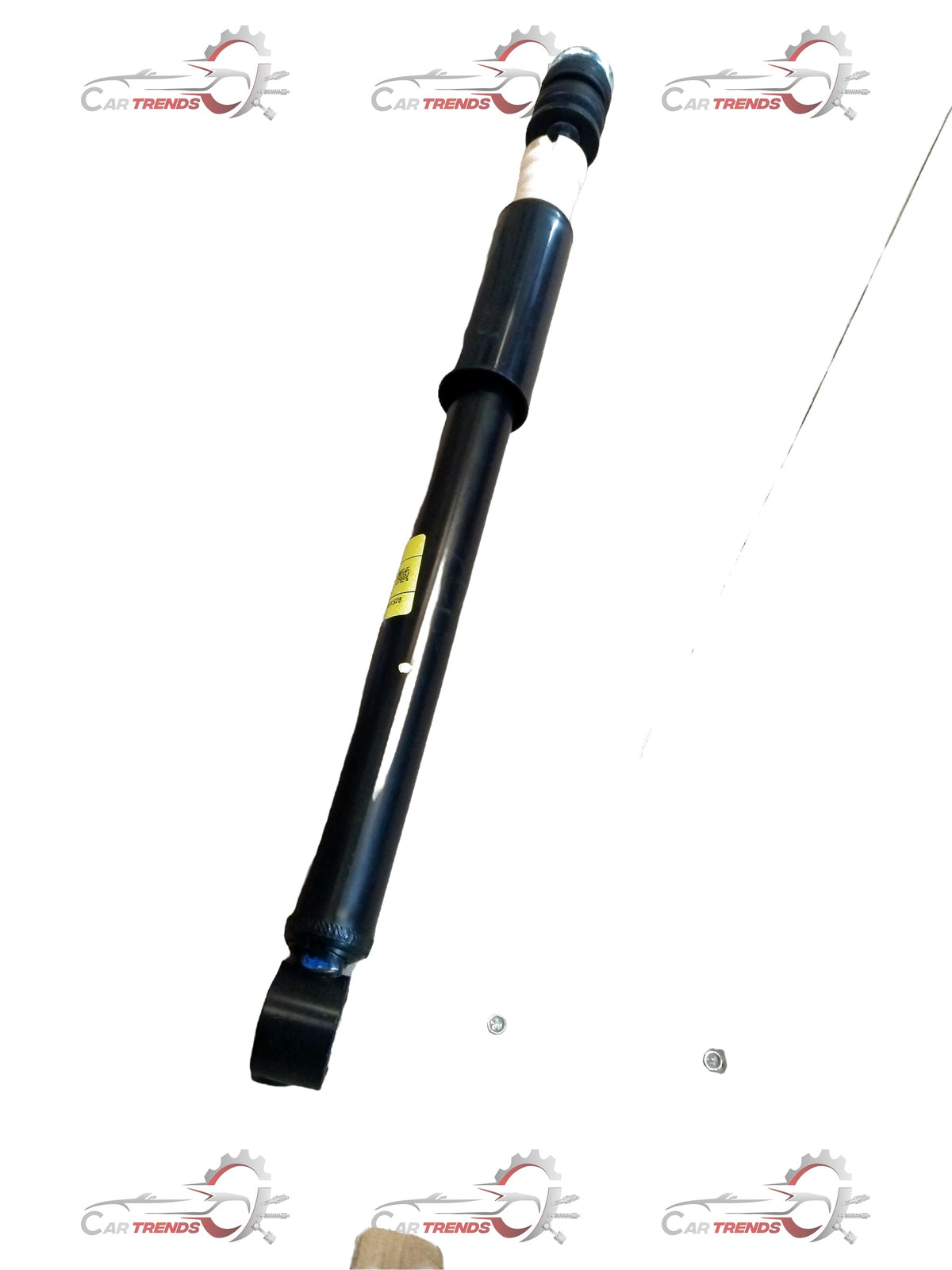 Rear shock absorber for Maruti Suzuki Ertiga, part number 41800M60M01, shown installed on the vehicle.