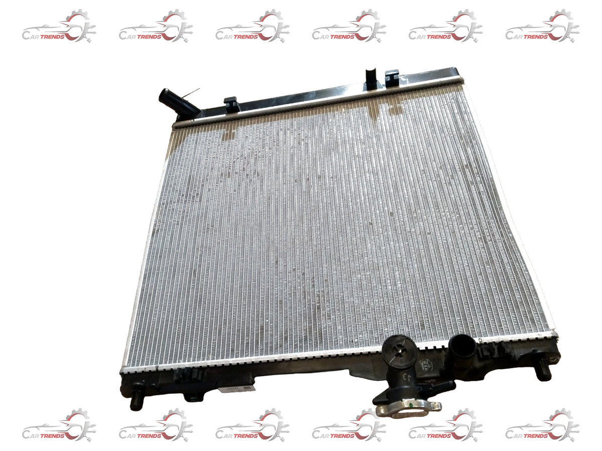 CarTrends radiator for Brezza 2nd Gen 2022+ petrol/CNG, showing the front view with cooling fins and mounting points.