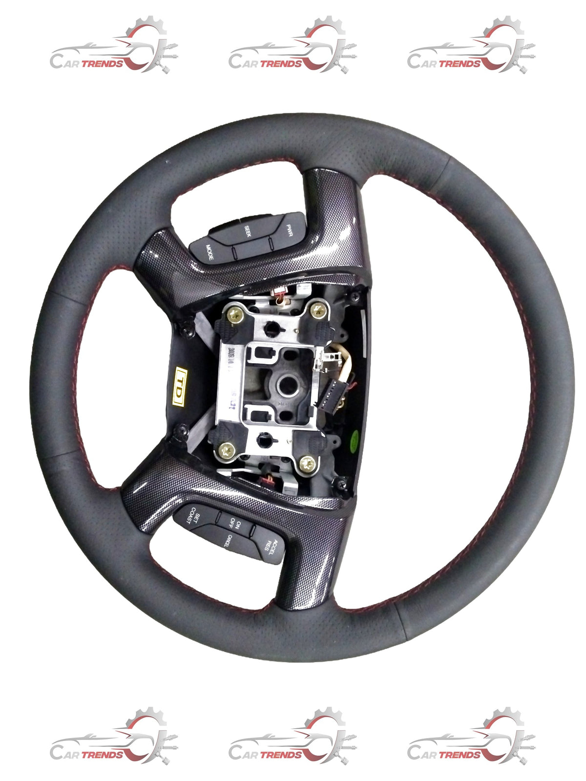 Steering wheel for Chevrolet Enjoy by General Motors, showing a close-up of the black automotive steering wheel with control buttons.