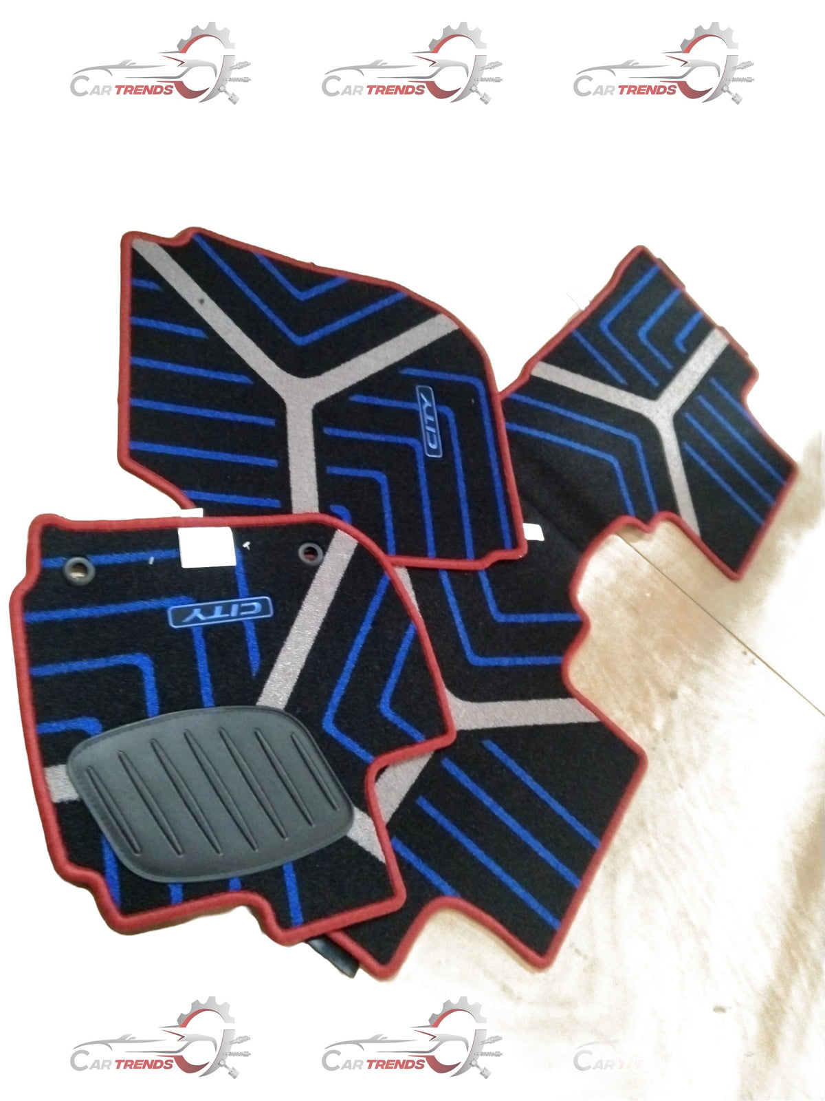 Red Honda floor mat for City, Amaze, Elevate, and WR-V models showcasing textured surface and custom fit.