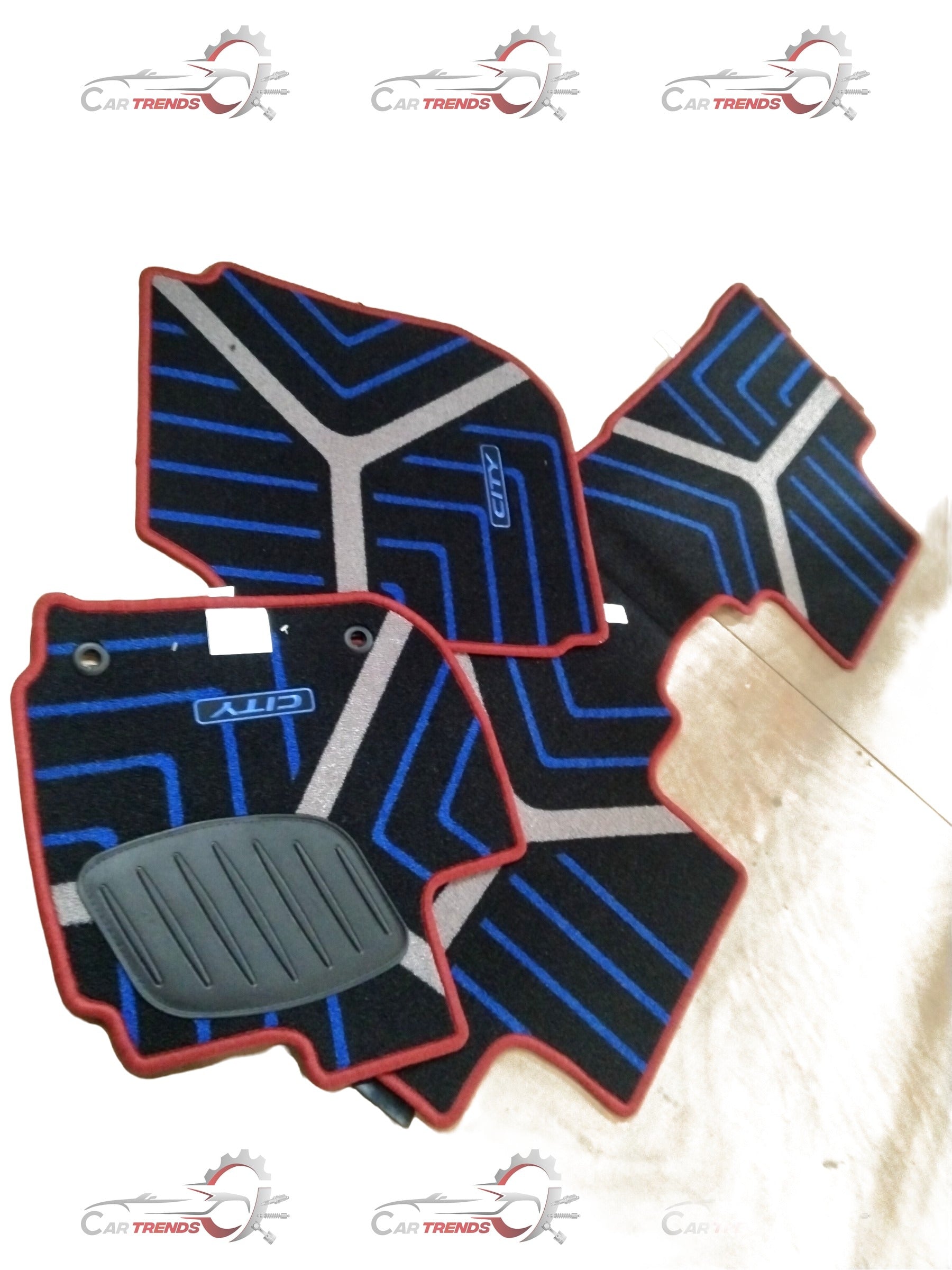 Red Honda floor mat for City, Amaze, Elevate, and WR-V models showcasing textured surface and custom fit.