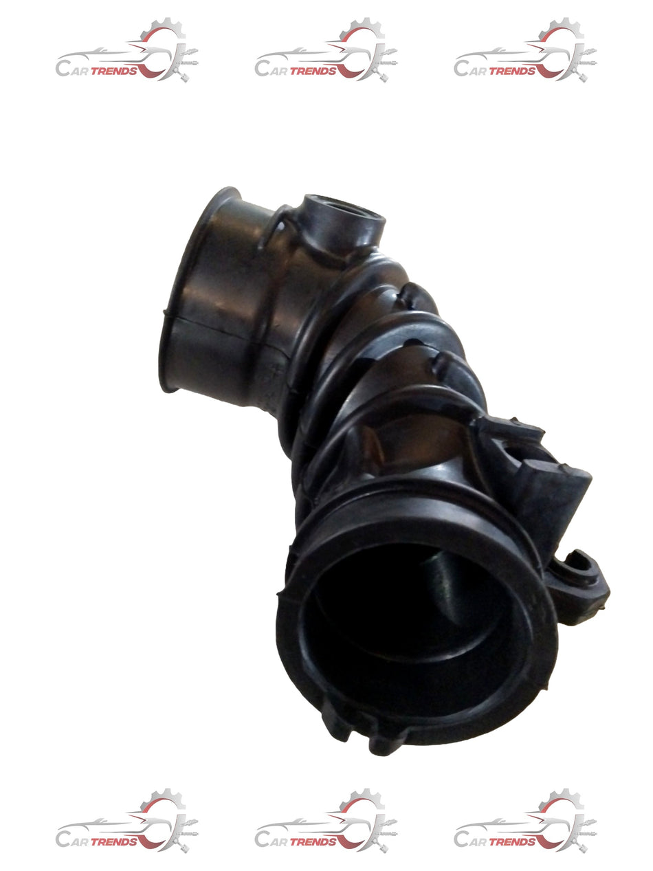Maruti Suzuki air cleaner hose for Baleno and Breeza models, showing a flexible black rubber hose with connectors.