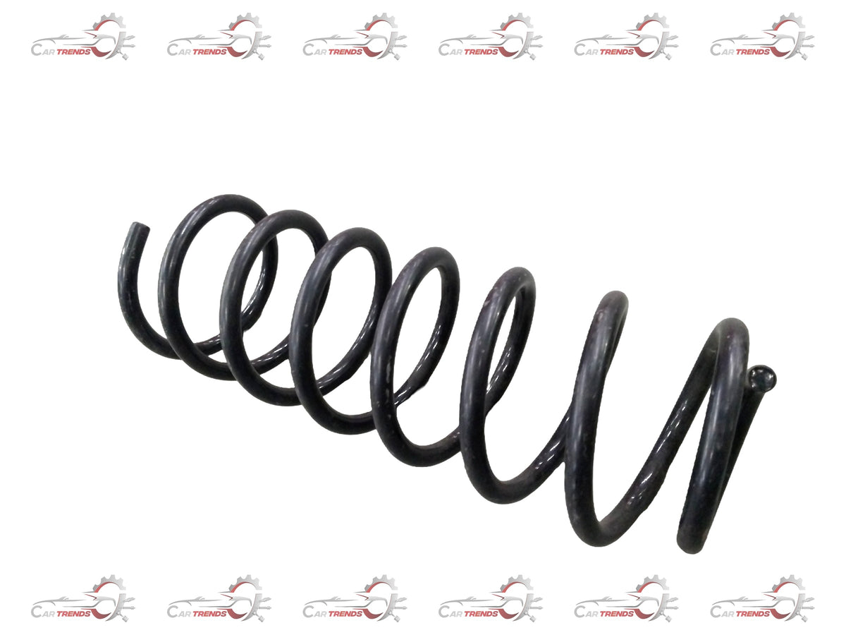 Rear spring coil for Chevrolet Aveo, branded by General Motors, showing the coiled metal suspension component.