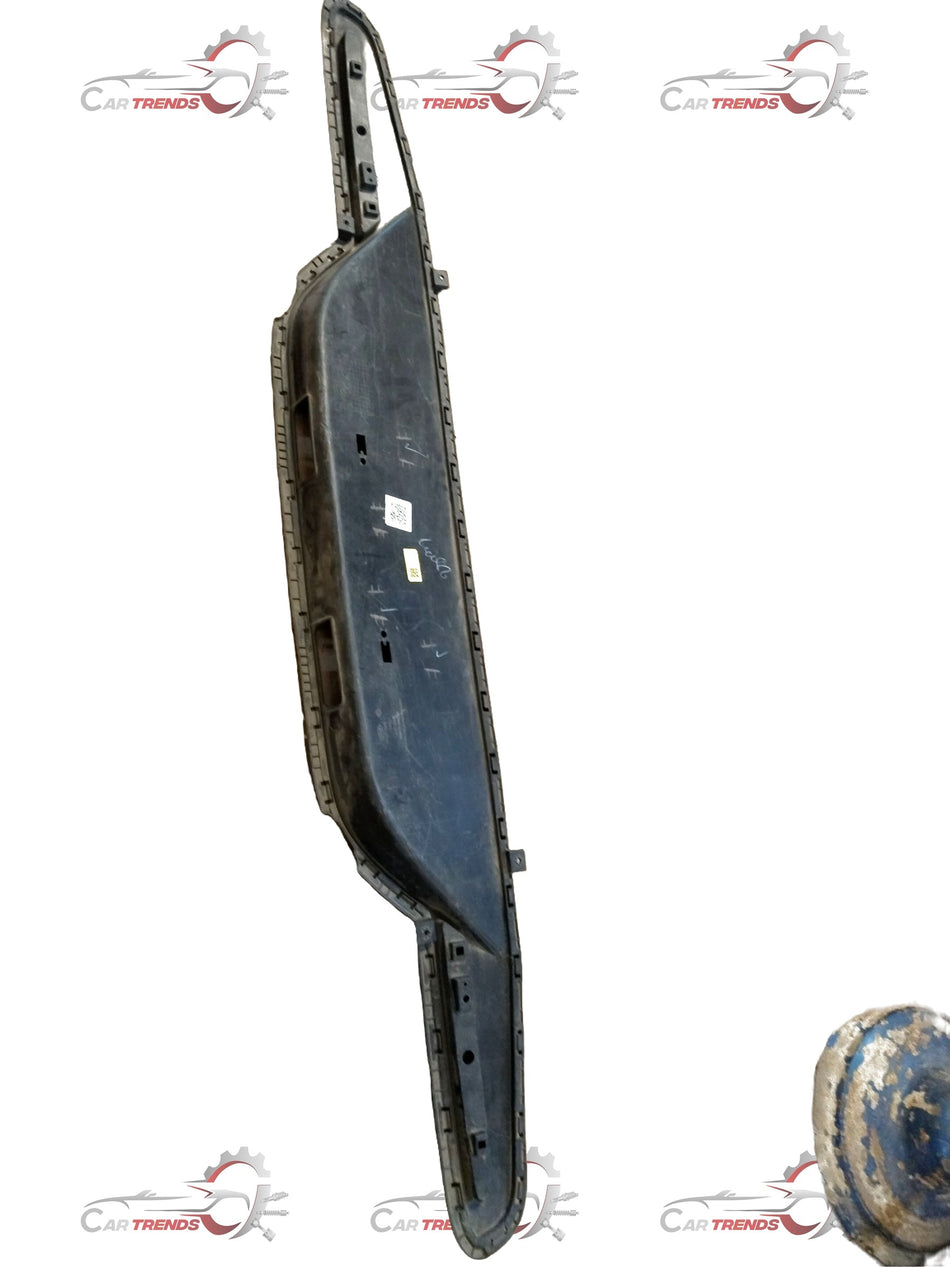 Hyundai Santro lower rear bumper in black, showing the exterior side with mounting points and smooth surface.