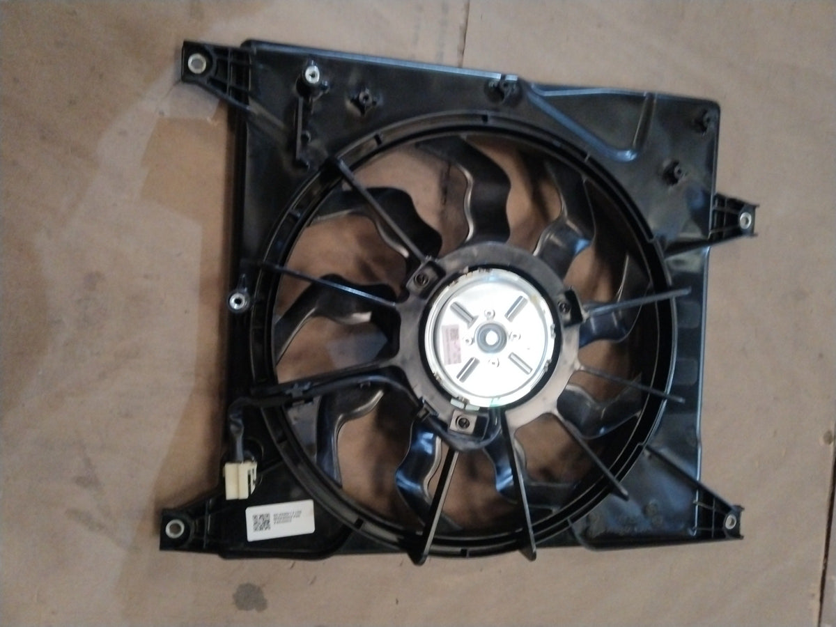 Maruti Suzuki S-Presso 2019+ fan assembly for petrol and CNG models, showing the black plastic fan blade and metal mounting frame.