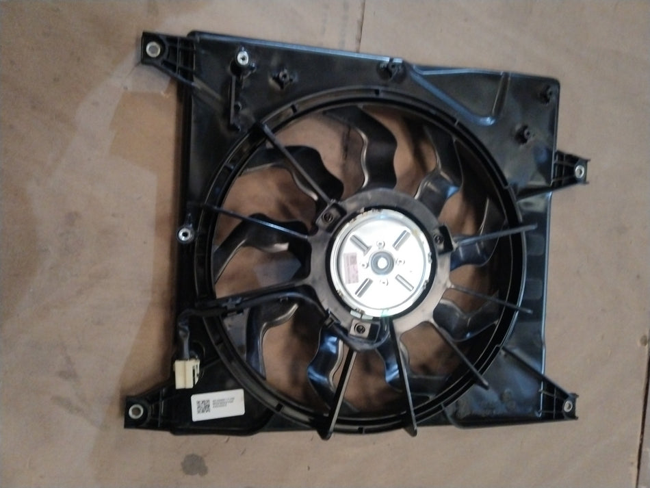 Maruti Suzuki S-Presso 2019+ fan assembly for petrol and CNG models, showing the black plastic fan blade and metal mounting frame.