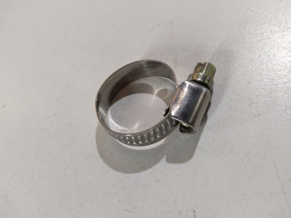 CarTrends heater outlet hose clip for Maruti Suzuki, black plastic clip securing heater hoses in engine compartment.