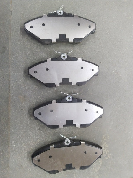Front brake pad for Mahindra XYLO, Bolero VLX, TUV300, Genio, and Bolero NEO by CarTrends, showing the brake pad with mounting features.