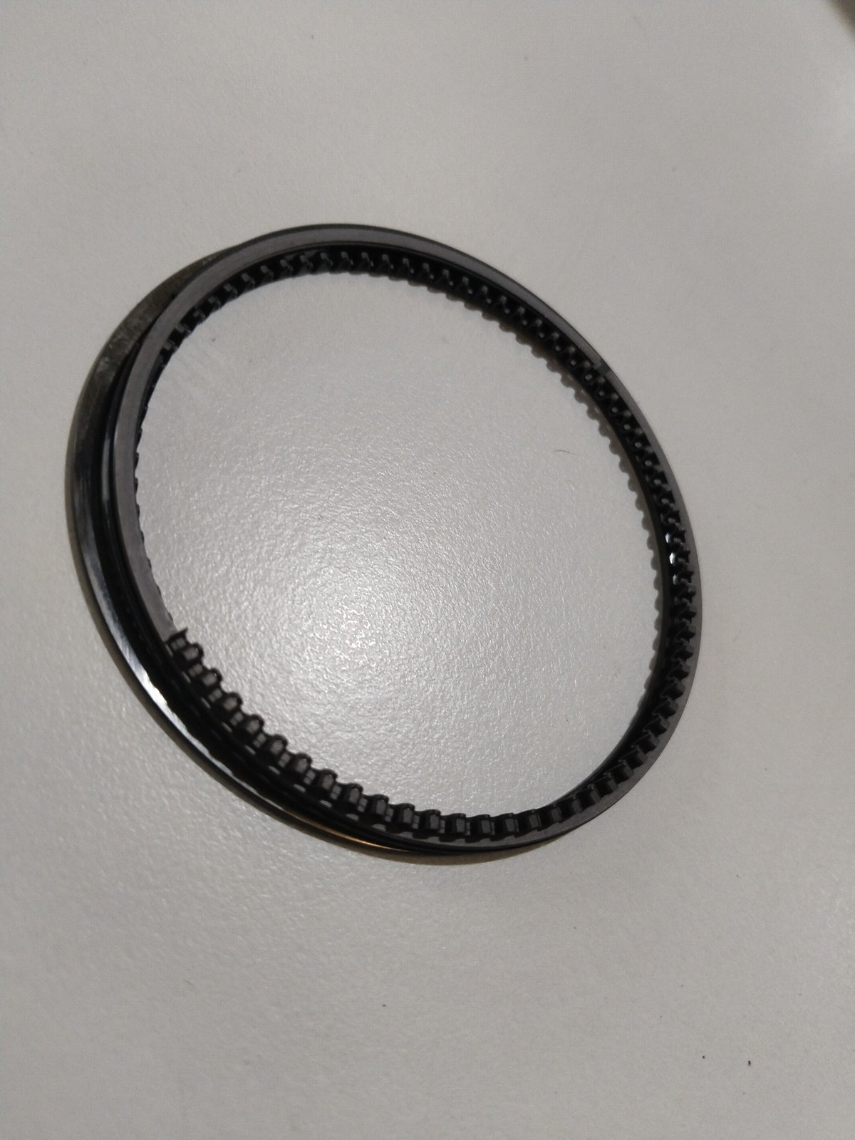 Maruti Suzuki piston ring set for Wagon R, A-Star, and Estilo vehicles, detailed metal components for engine performance.