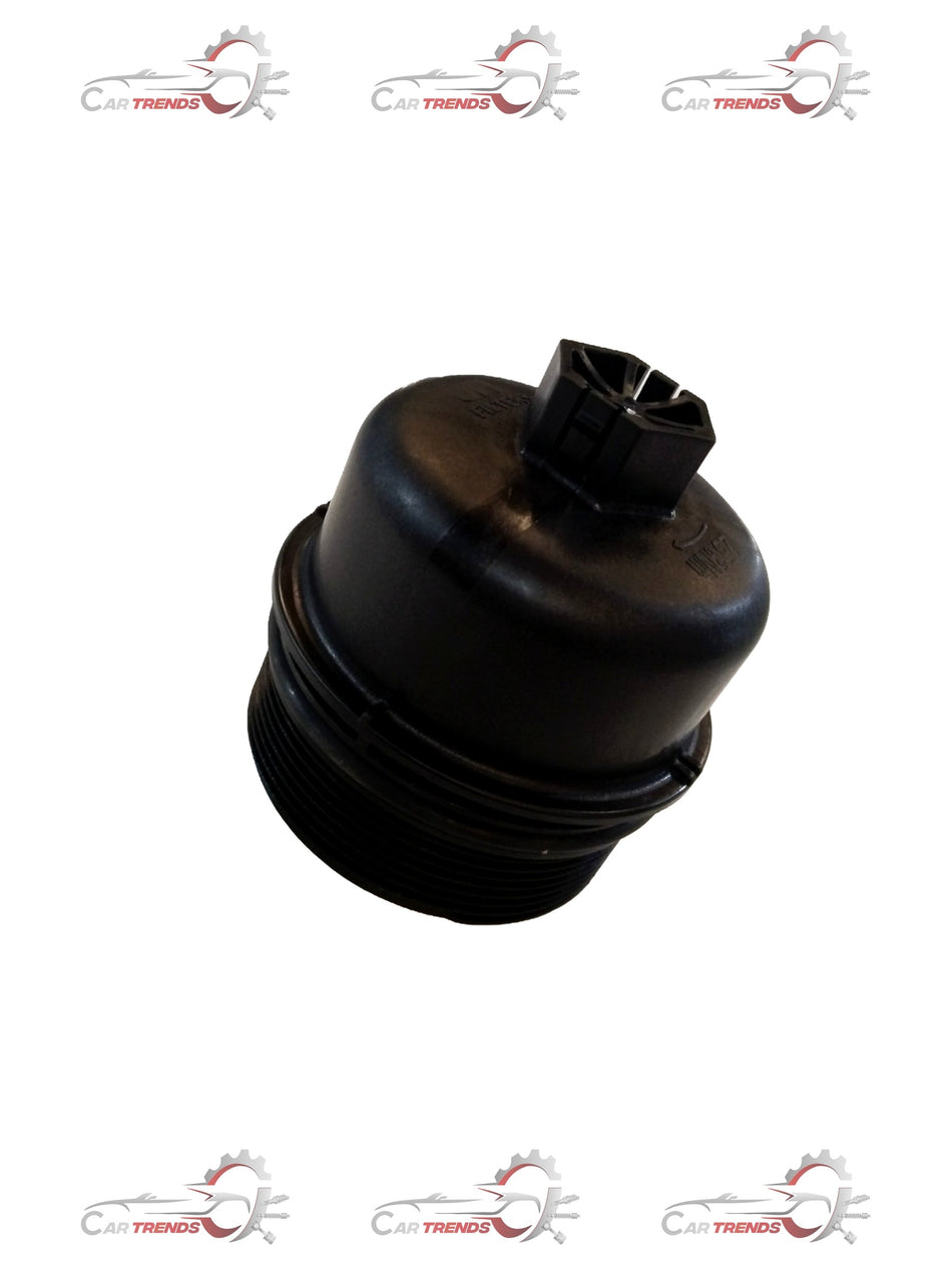 Maruti Suzuki CAP oil filter 16540M86J20 displayed, showing the black cylindrical filter with metal ends.