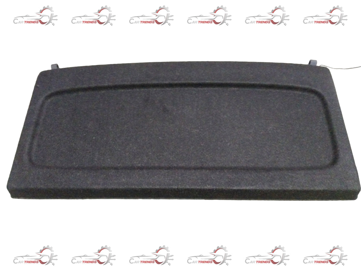 Maruti Suzuki rear parcel shelf for car interior, showing a black fabric panel with mounting edges.