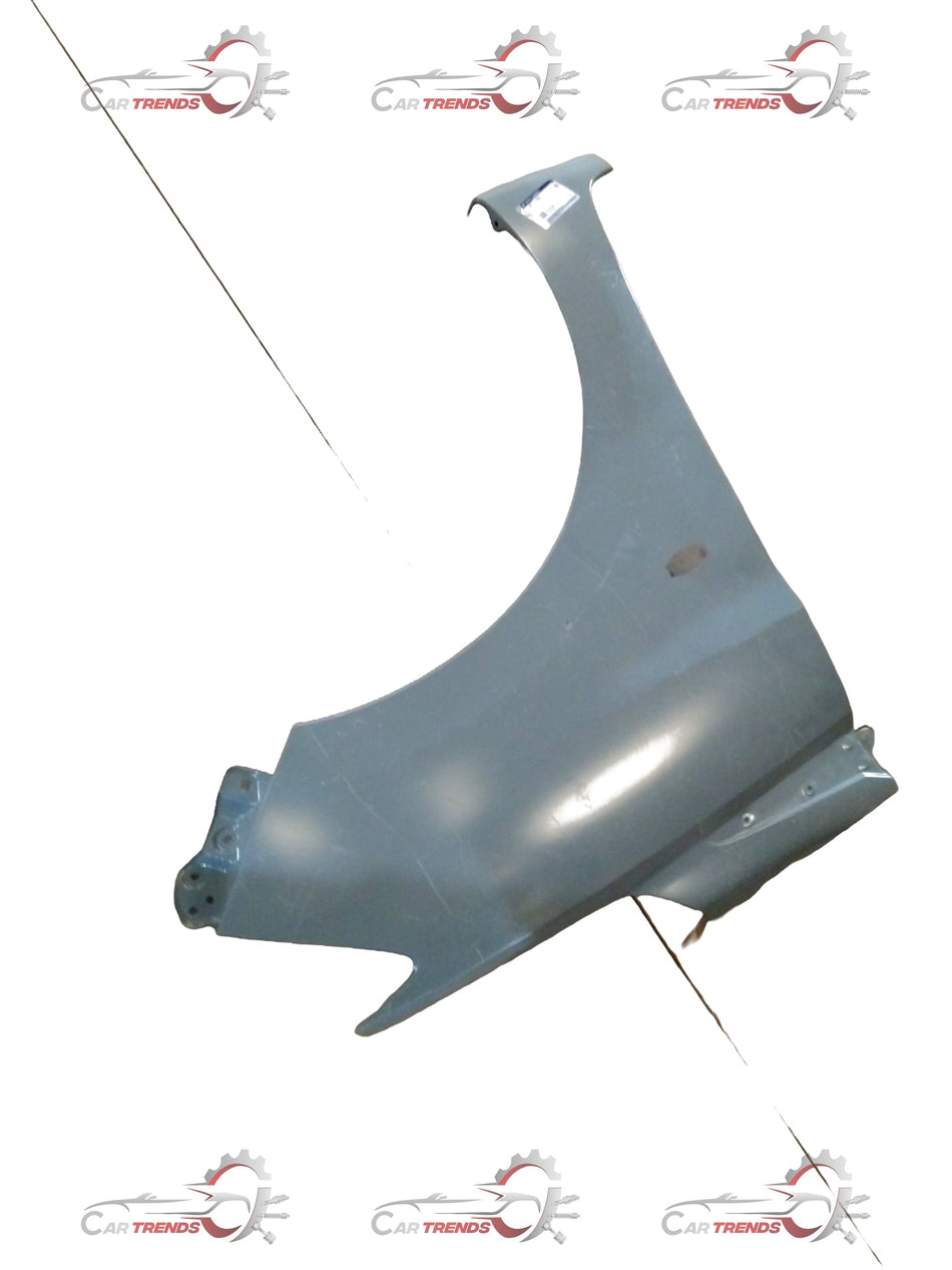 Maruti Suzuki Fender Right side for Suzuki Ertiga, part number 57611M73R00, in close-up showing the vehicle's exterior panel.
