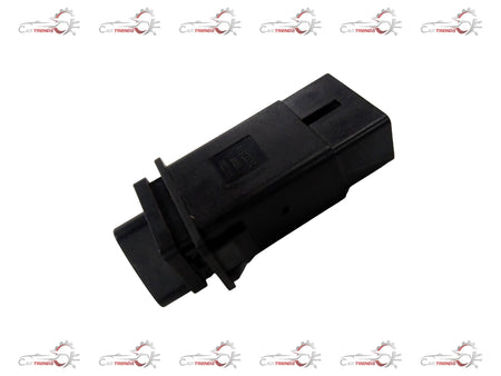 General Motors Chevrolet Enjoy hazard warning switch assembly installed on the dashboard, showing electrical components and connectors.