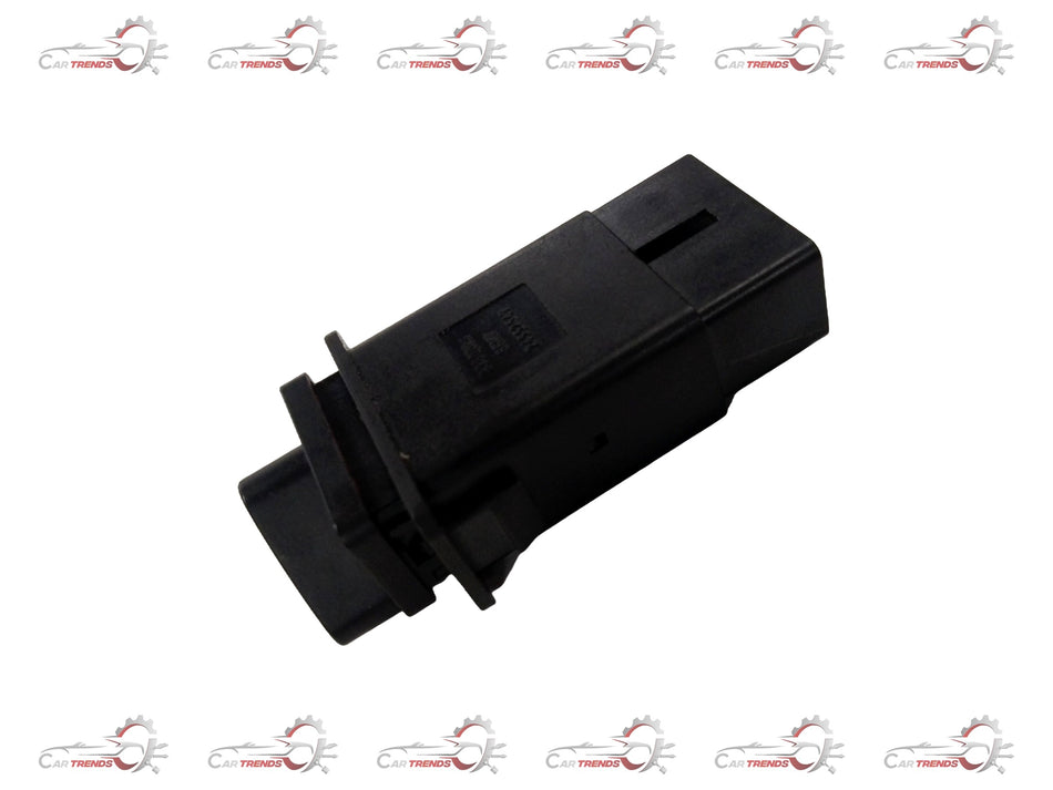 General Motors Chevrolet Enjoy hazard warning switch assembly installed on the dashboard, showing electrical components and connectors.