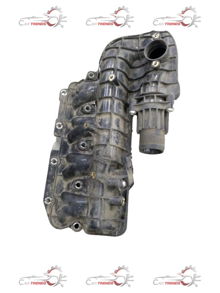 General Motors manifold intake for Chevrolet Enjoy, shows the engine component with metal construction and mounting points.