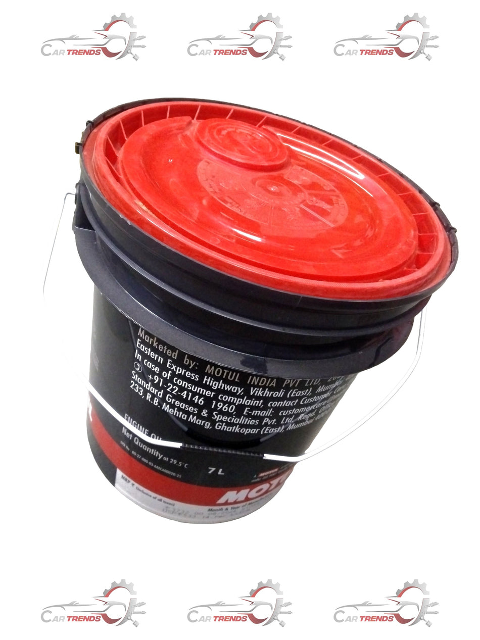 Motor oil bottle labeled MOTUL 15W40 7LTR Motion Plus, with product details and branding visible on the container.