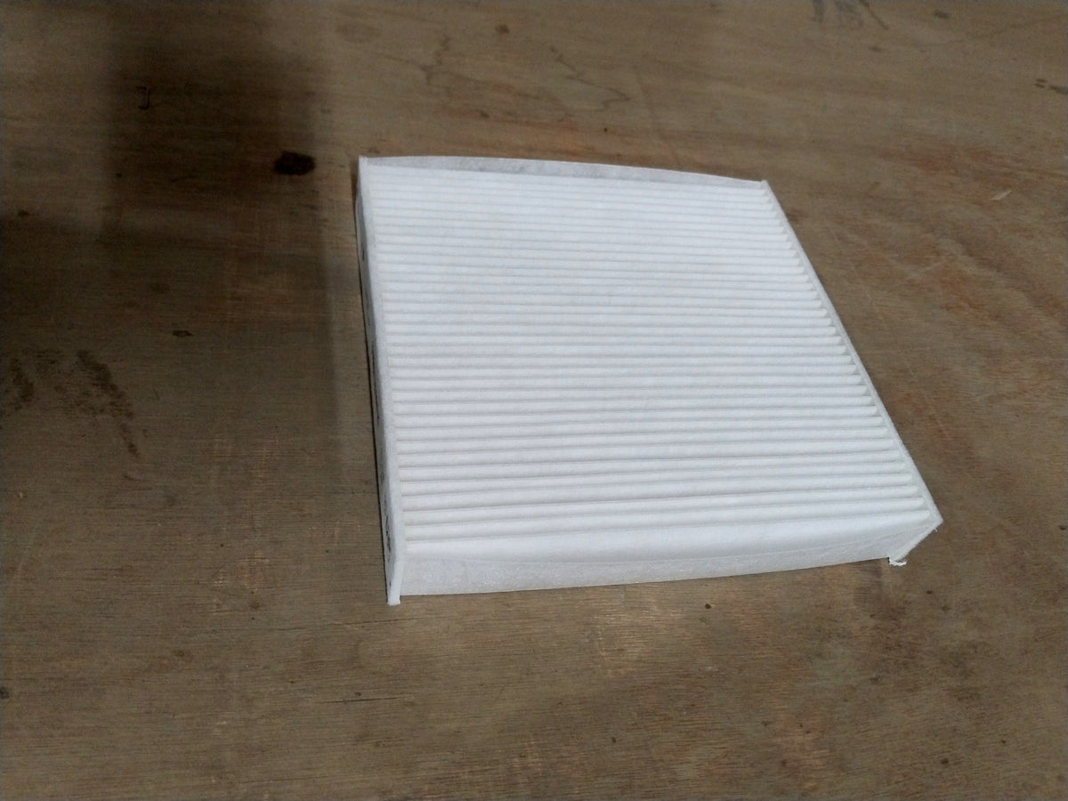 MARUTI SUZUKI AIR CONDITIONING FILTER | SUZUKI BALENO/ERTIGA/FRONX | #990J0M56RS0010 990J0M56RS0010 - Back view