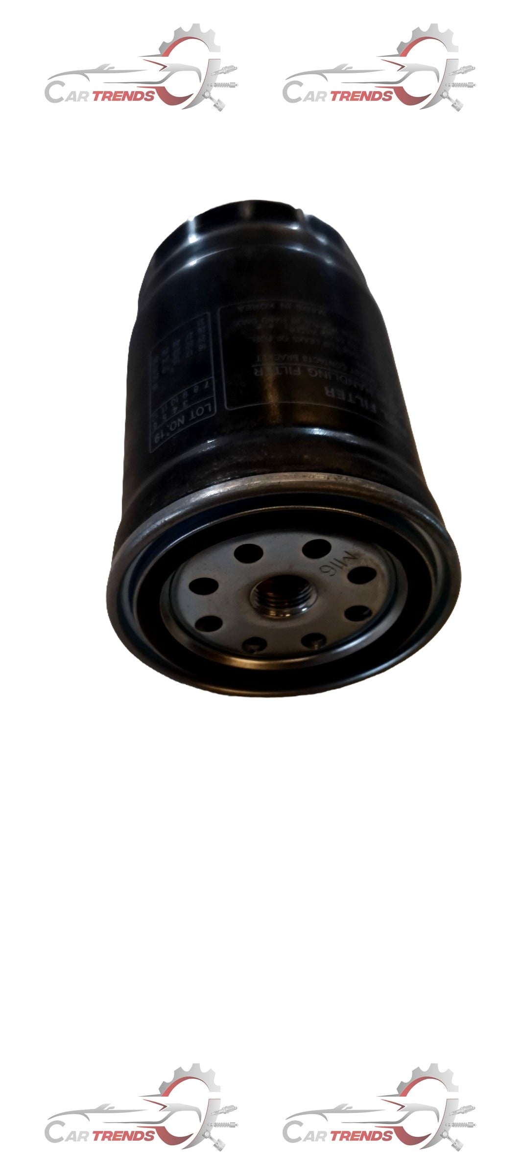 CarTrends fuel filter for Creta, spare parts, showing a cylindrical metal component with inlet and outlet ports.