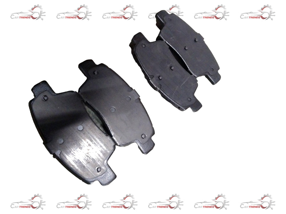 Front brake pad for Triber, Magnite, Kwid from CarTrends, showing the black friction material and metal backing plate.