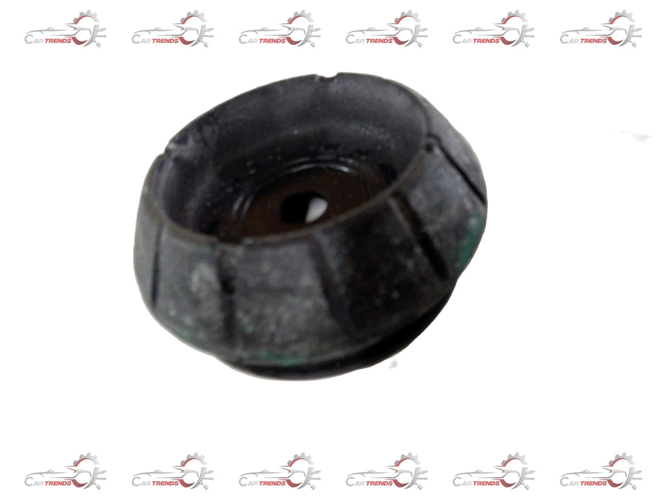 Maruti Ertiga shocker mount spare part by CarTrends, front view showing mounting points and rubber insulation.
